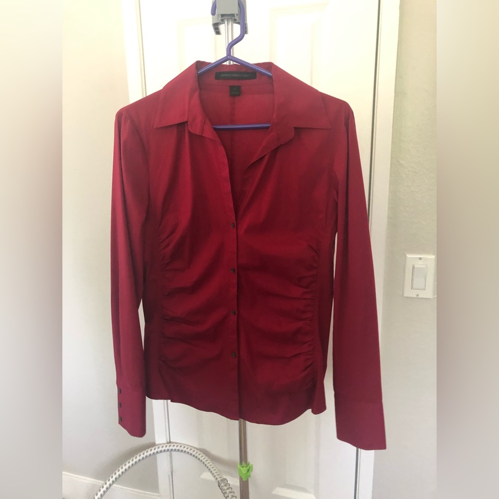 Express long sleeve button down with ruched detail.